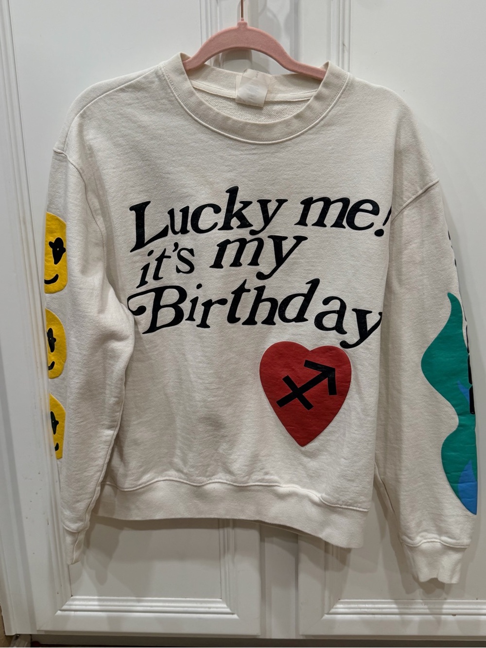 Kanye West Cream Crewneck Sweater with Graphic Heart and Slogan